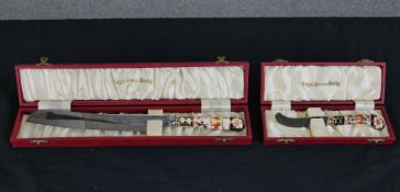 Two boxed Royal Crown Derby Imari porcelain handled knives. H.3.5 W.33 D.6cm largest