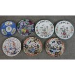 Seven assorted 19th century and later painted stoneware plates to include a pair of Chinese style
