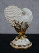 A late 19th century Royal Worcester porcelain spoon warmer modelled in the form of a nautilus
