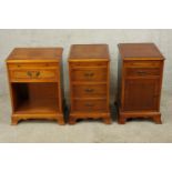 Three assorted contemporary Yew wood bedside cabinets comprising of a three drawer chest of drawers,