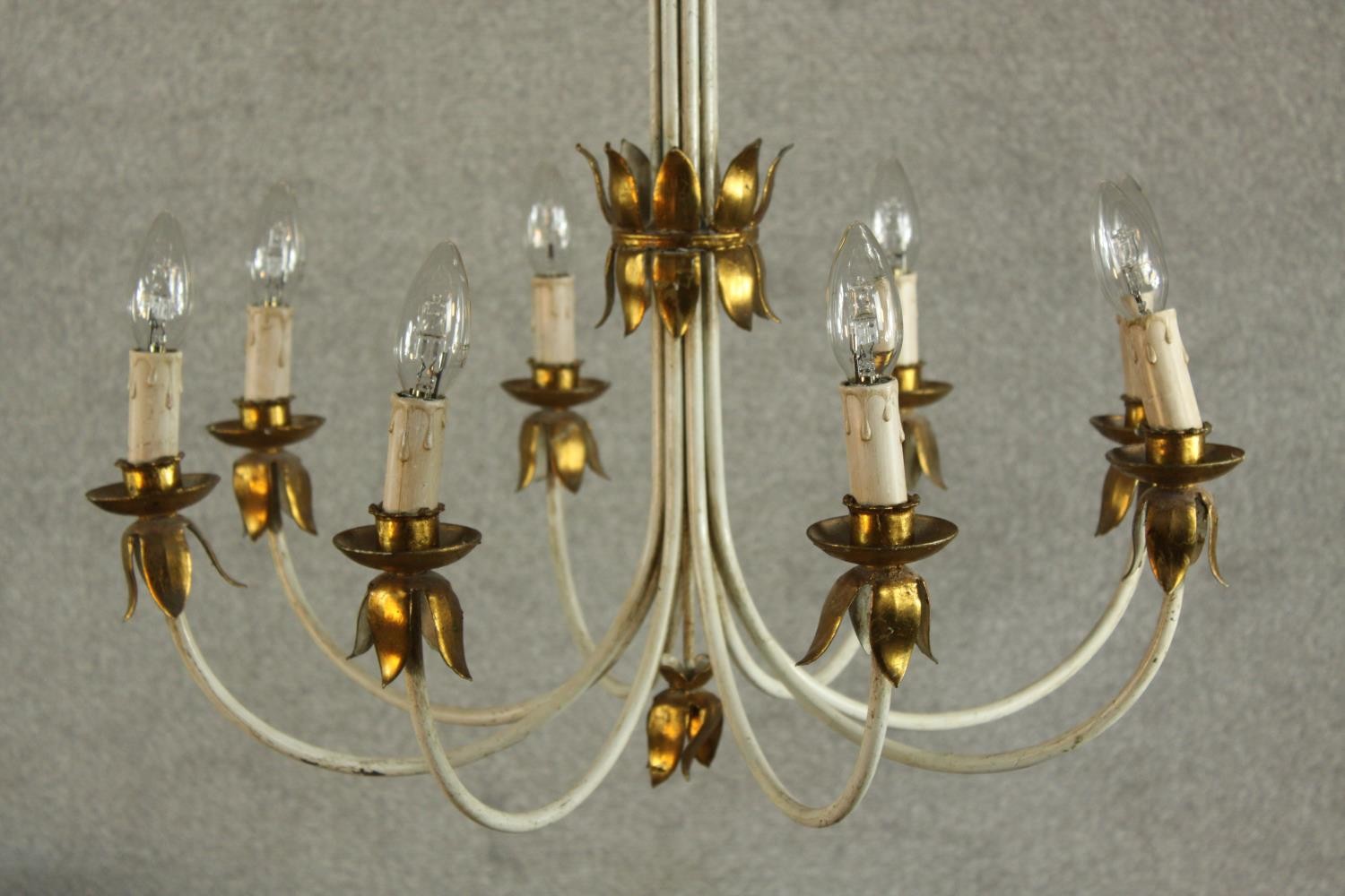 A contemporary painted metal eight branch hanging electrolier with gilt metal mounts. H.66cm.