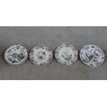 Three early 19th century painted Spode stoneware plates decorated with flowers, together with a 19th