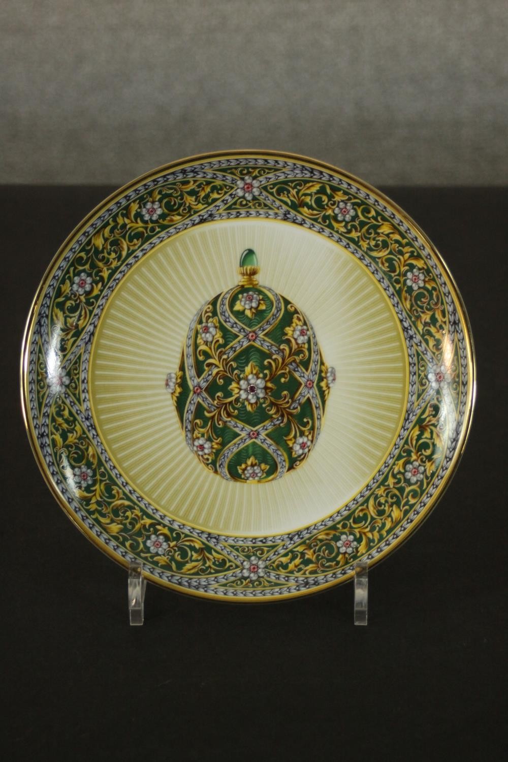 A Franklin Mint Limited edition House of Fabergé Garden of Jewels Imperial Egg plate, the centre set