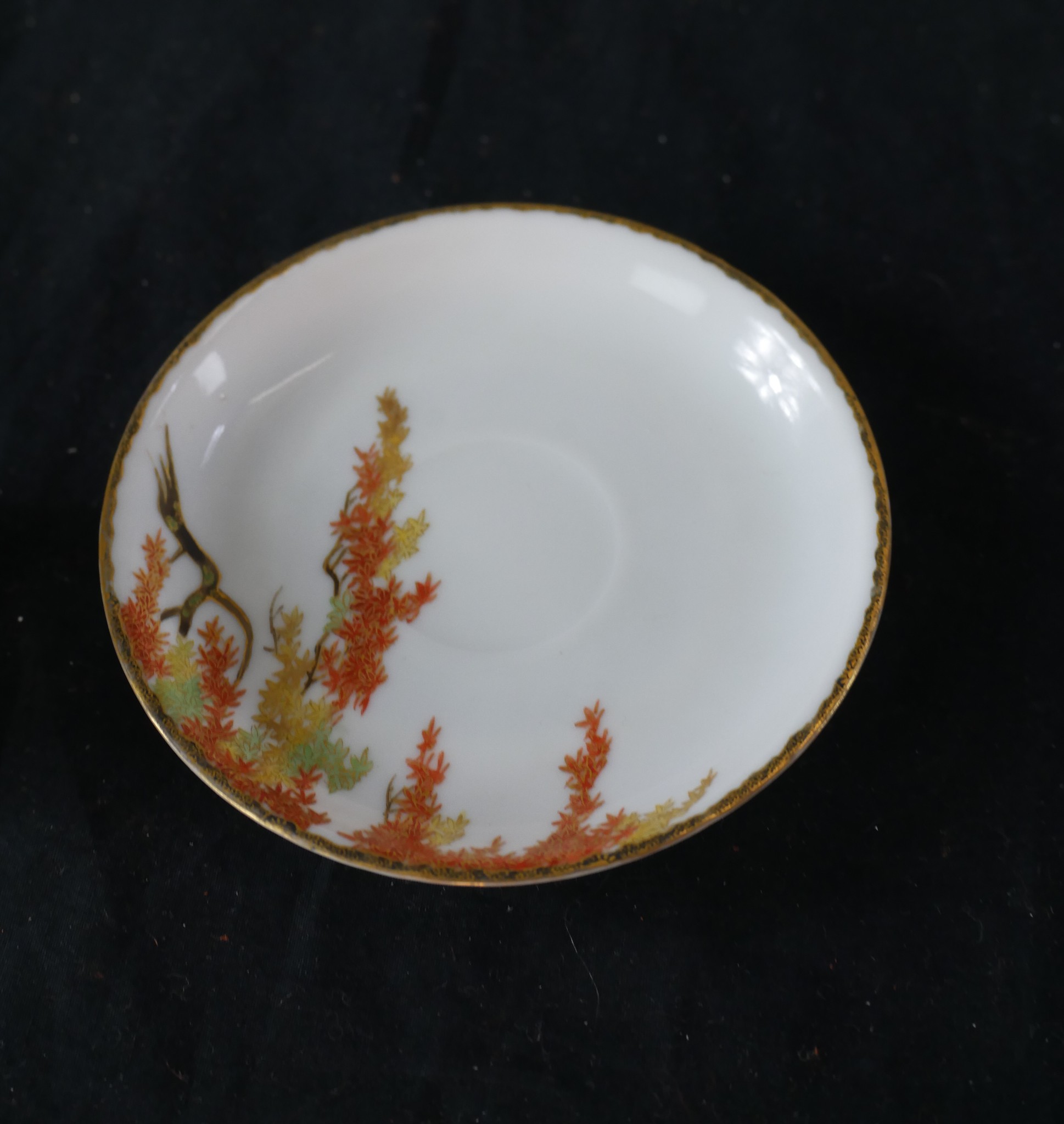 A set of four Chinese porcelain cups and saucers, decorated with autumn leaves, (with additional - Image 5 of 5