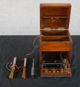A 19th mahogany cased electrotherapy electric shock kit. H.21 W.17.5 D.16