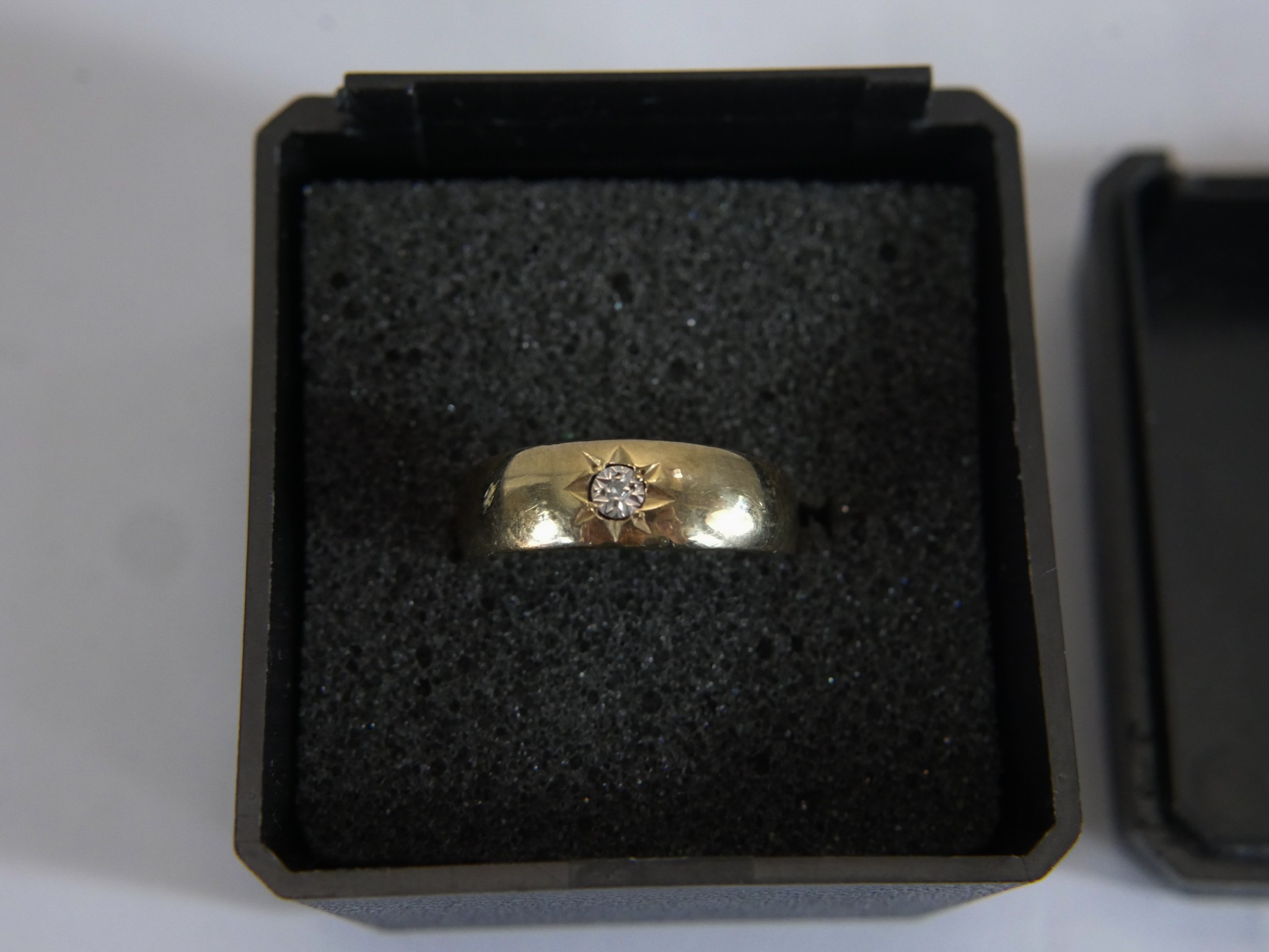 A 9ct gold diamond set band, the eight cut diamond in a star cut setting. Hallmarked:375, Sheffield, - Image 3 of 4