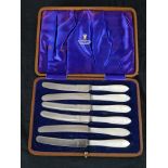 A cased set of six early 20th John Bradshaw & Sons mother of pearl handled butter knives, in