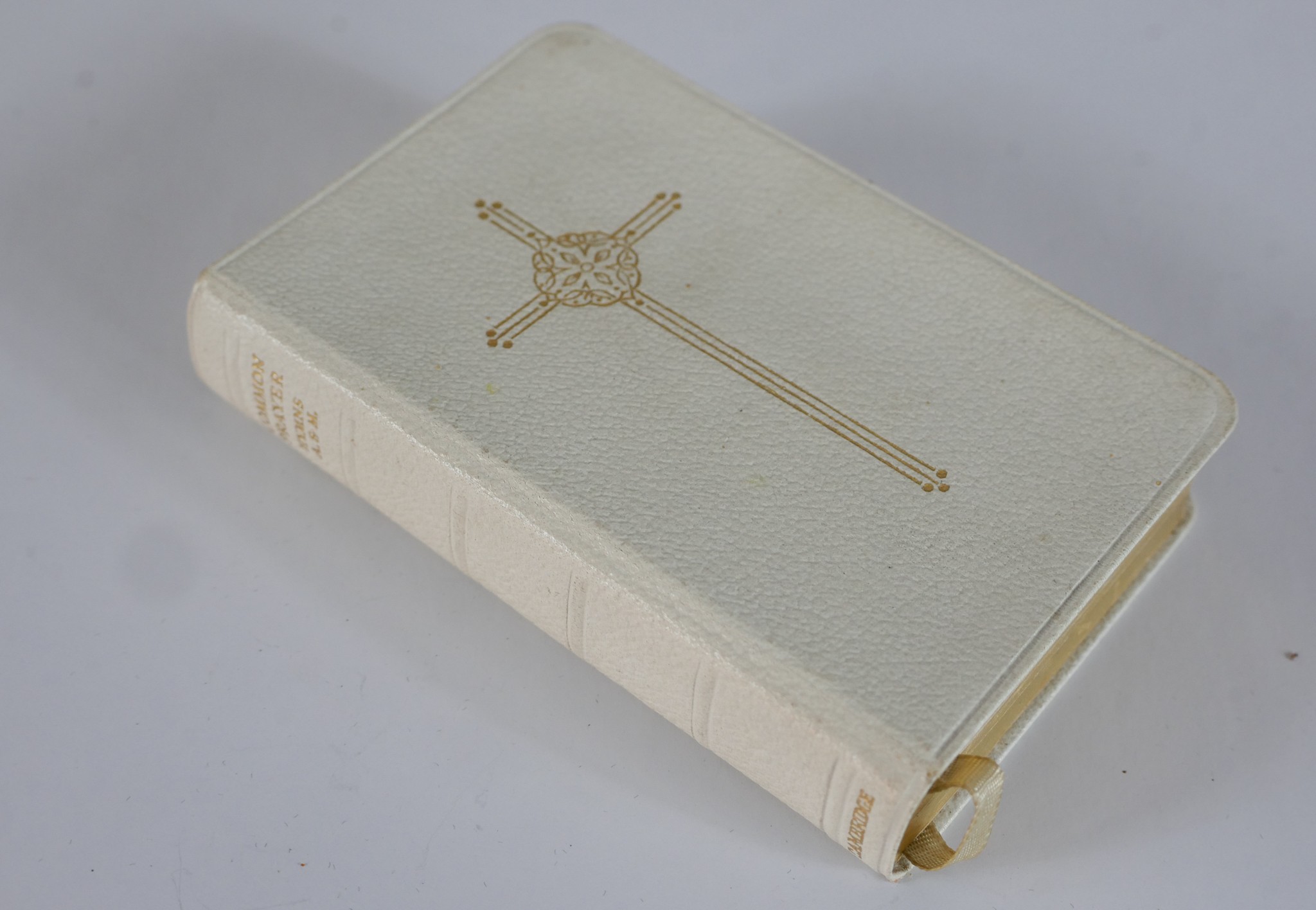 A 20th century white leather bound Book of Common Prayer and Hymns Ancient & Modern. H.12 W.8 D.2cm