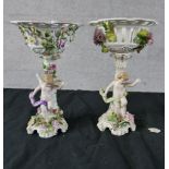 A pair 20th Schierholz Porzellanmanufaktur (German porcelain) floral encrusted tazzas, each with