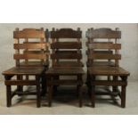 A set of six contemporary oak Gothic style ladder back dining chairs.