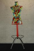 Foxy (Contemporary), a three dimensional collage female mannequin with painted geometric pattern