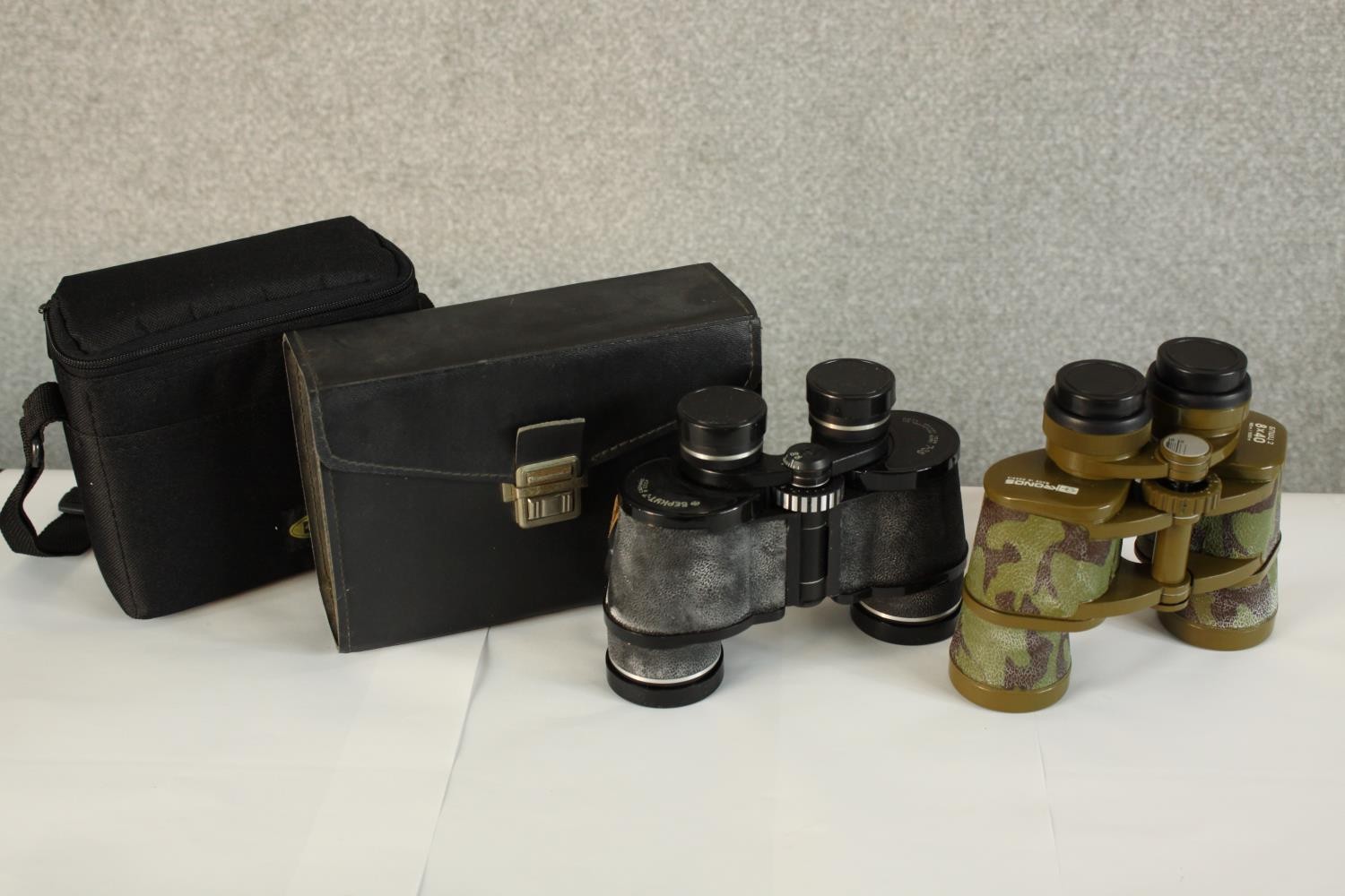 Two pairs of 20th century Russian cased military issue binoculars. H.15cm. (largest)