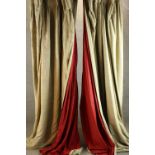 A pair of gold and red velvet lined curtains. H.230cm. (each)