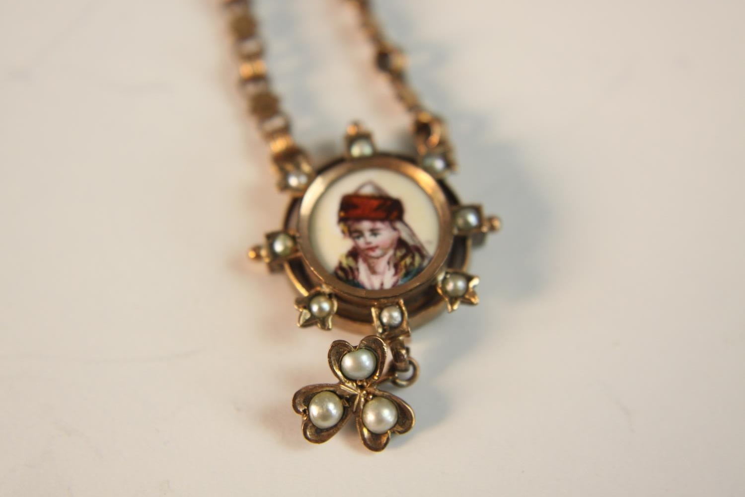 A 19th century rose gold plated watch fob, the end pendant a hand painted portrait on enamel of a - Image 3 of 7