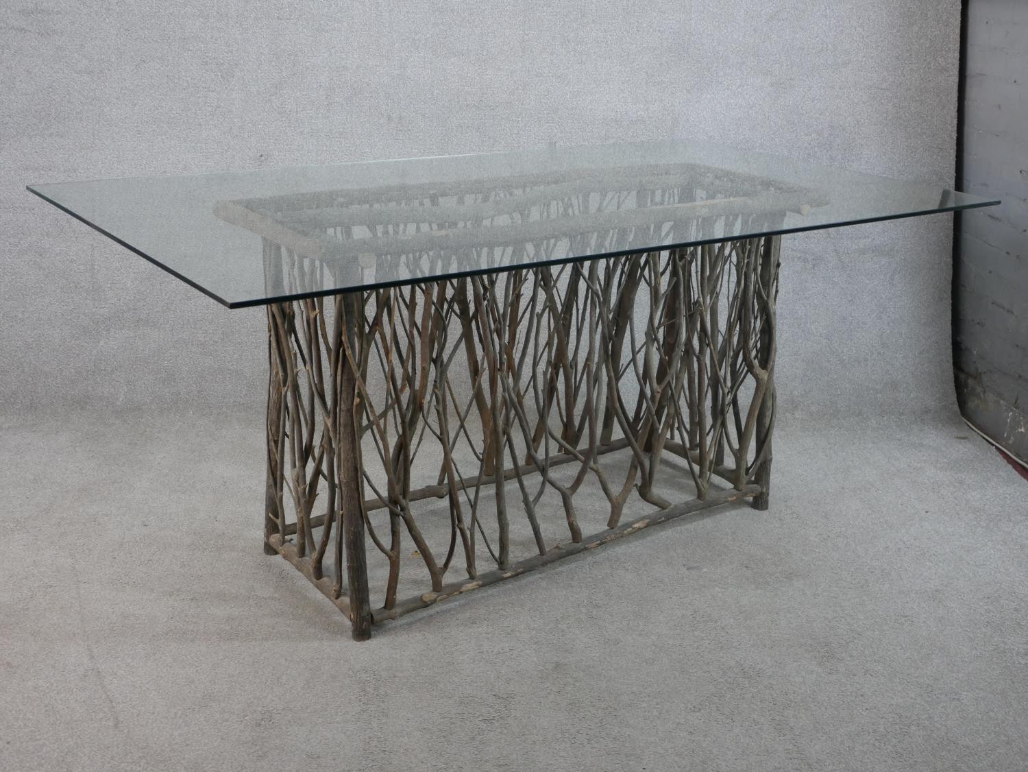 A contemporary glass topped table raised on modernist rectangular twig base. H.77 W.180 D.100cm - Image 5 of 5