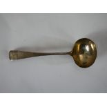 A late Victorian hallmarked silver crested sauce ladle, London 1881. H.18 W.6 D.3cm. 64g gross