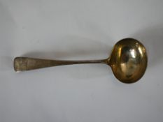 A late Victorian hallmarked silver crested sauce ladle, London 1881. H.18 W.6 D.3cm. 64g gross