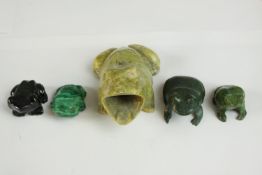 Five carved stone frogs, including Malachite, slate and jade. H.7cm. (largest)