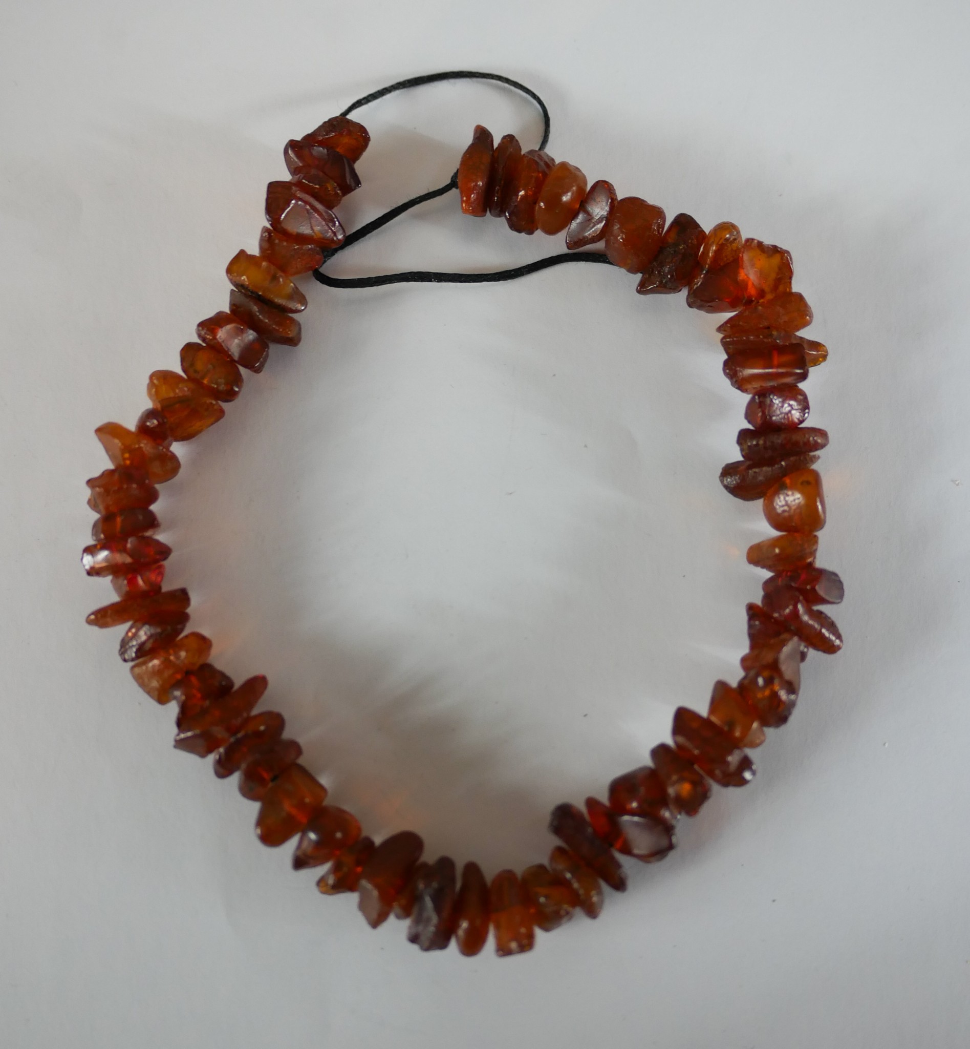 Four strings of polished natural amber chips. H.21 W.24cm largest - Image 4 of 5