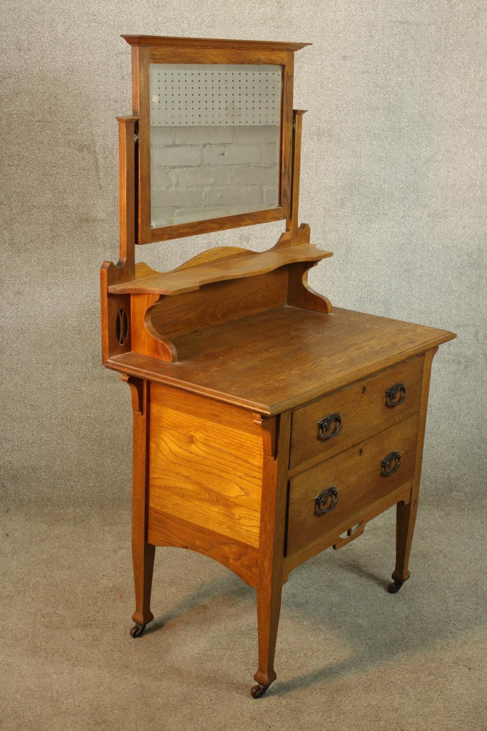 A late 19th/early 20th century mirror back oak two drawer dressing chest raised on turned supports - Image 4 of 4