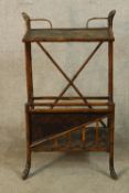 A late 19th century floor standing bamboo magazine rack raised on splayed supports. H.91 W.50 D.