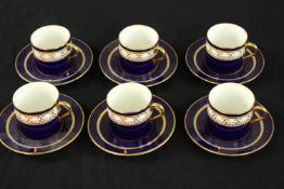 Six 20th century Lynton Derby for Lloyds of London coffee cups and saucers. H.6cm. (each)