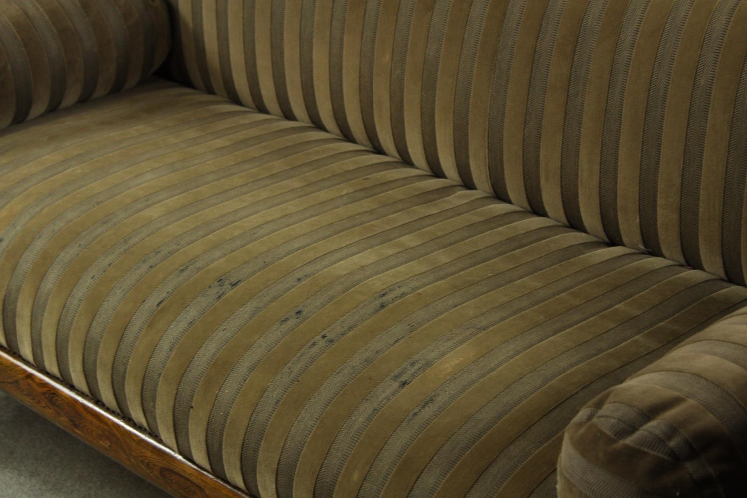 A Regency rosewood framed scroll arm settee upholstered in brown fabric, raised on four outswept - Image 10 of 10