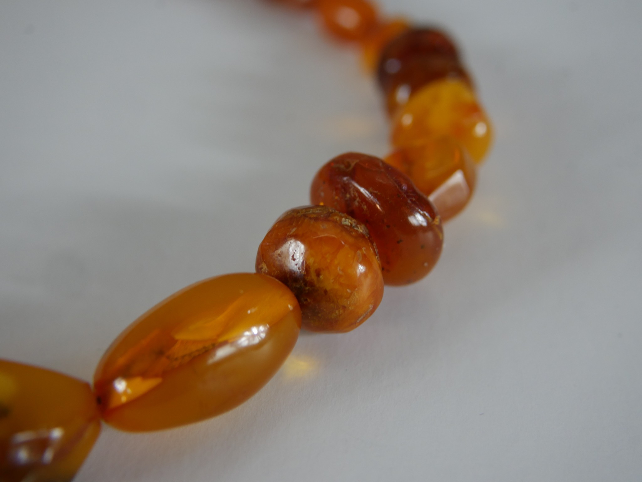 A large string of graduated amber beads, the largest bead measures 3.8cm. L.48cm. - Image 2 of 3