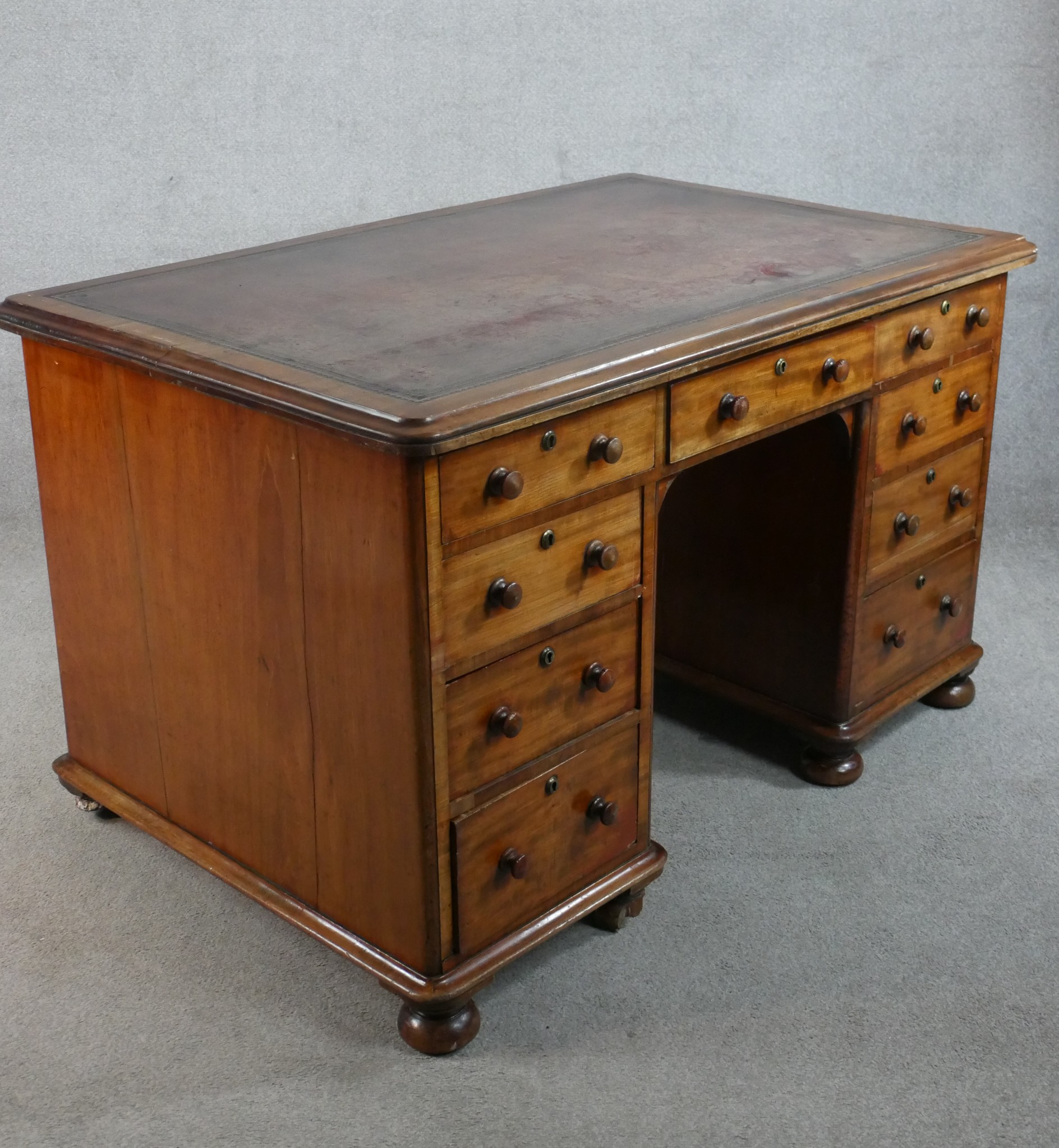 A Victorian mahogany and leather inset twin pedestal writing desk with turned handles raised on - Image 6 of 7