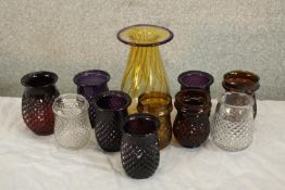 A 20th century Scandinavian amber glass to include a quantity cut glass tealight holders. H.18cm. (