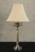 A 20th century white metal 'palm tree' table lamp raised on stepped circular base. H.73cm.