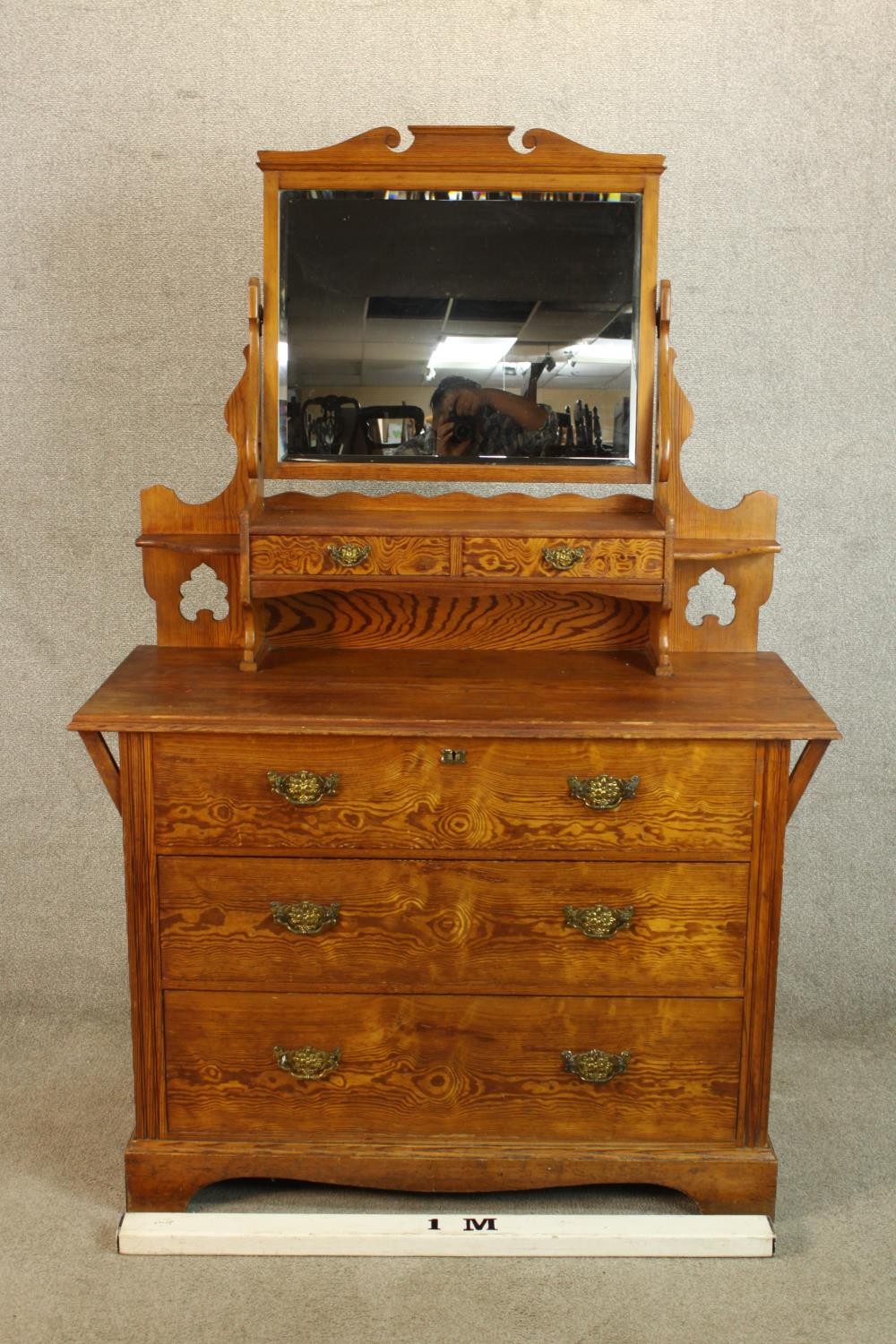 A late 19th/early 20th century pine mirror back dressing chest with three long drawers raised on - Image 2 of 4