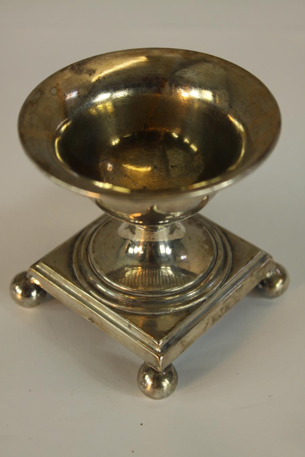 An early 19th century French silver campagna shaped table salt on stepped square base raised on four - Image 3 of 3