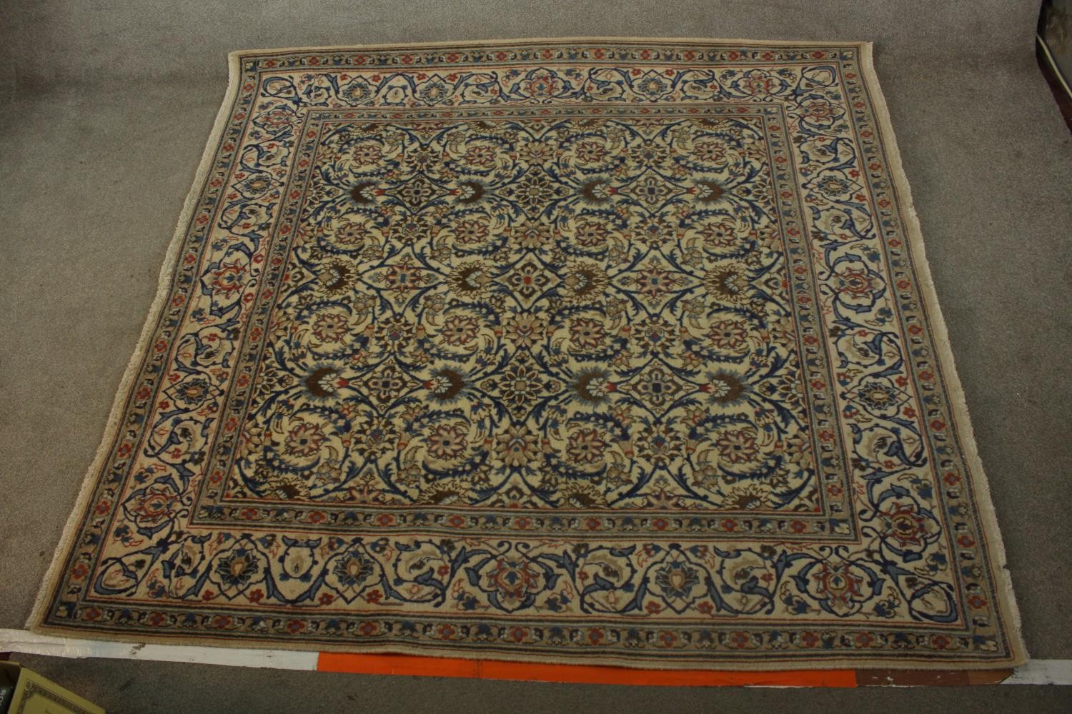 An 20th century Persian woollen carpet with all over floral and scroll decoration. L.203 W.194cm. - Image 2 of 5