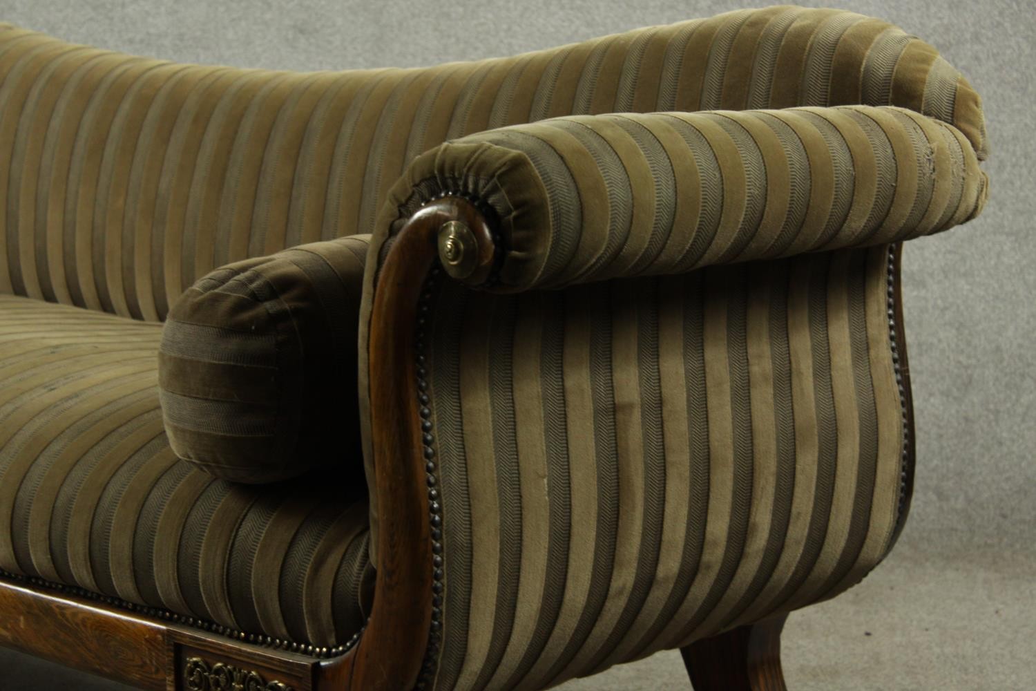 A Regency rosewood framed scroll arm settee upholstered in brown fabric, raised on four outswept - Image 8 of 10