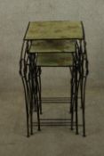 A set of three contemporary square metal and composite nest of three garden tables. H.68cm.