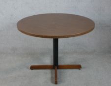 A mid 20th century Danish teak circular topped occasional table raised on four splayed supports. H.