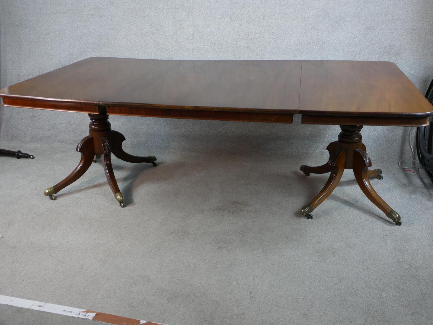 A Regency mahogany twin pedestal extending dining table raised on central turned column each with - Image 4 of 5