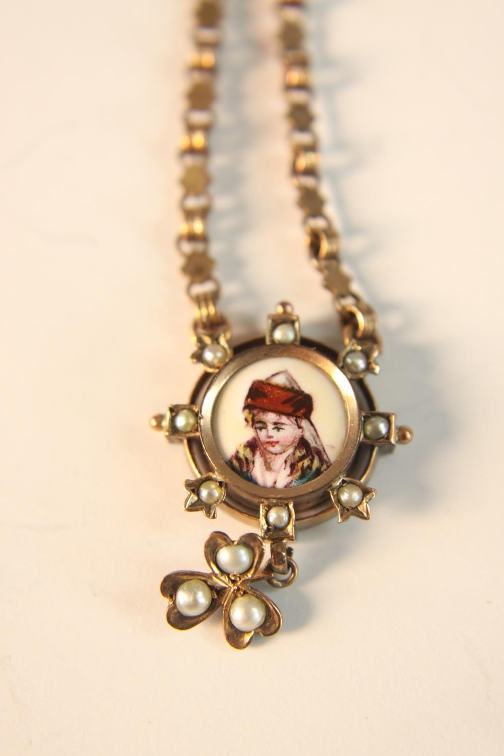 A 19th century rose gold plated watch fob, the end pendant a hand painted portrait on enamel of a - Image 5 of 7
