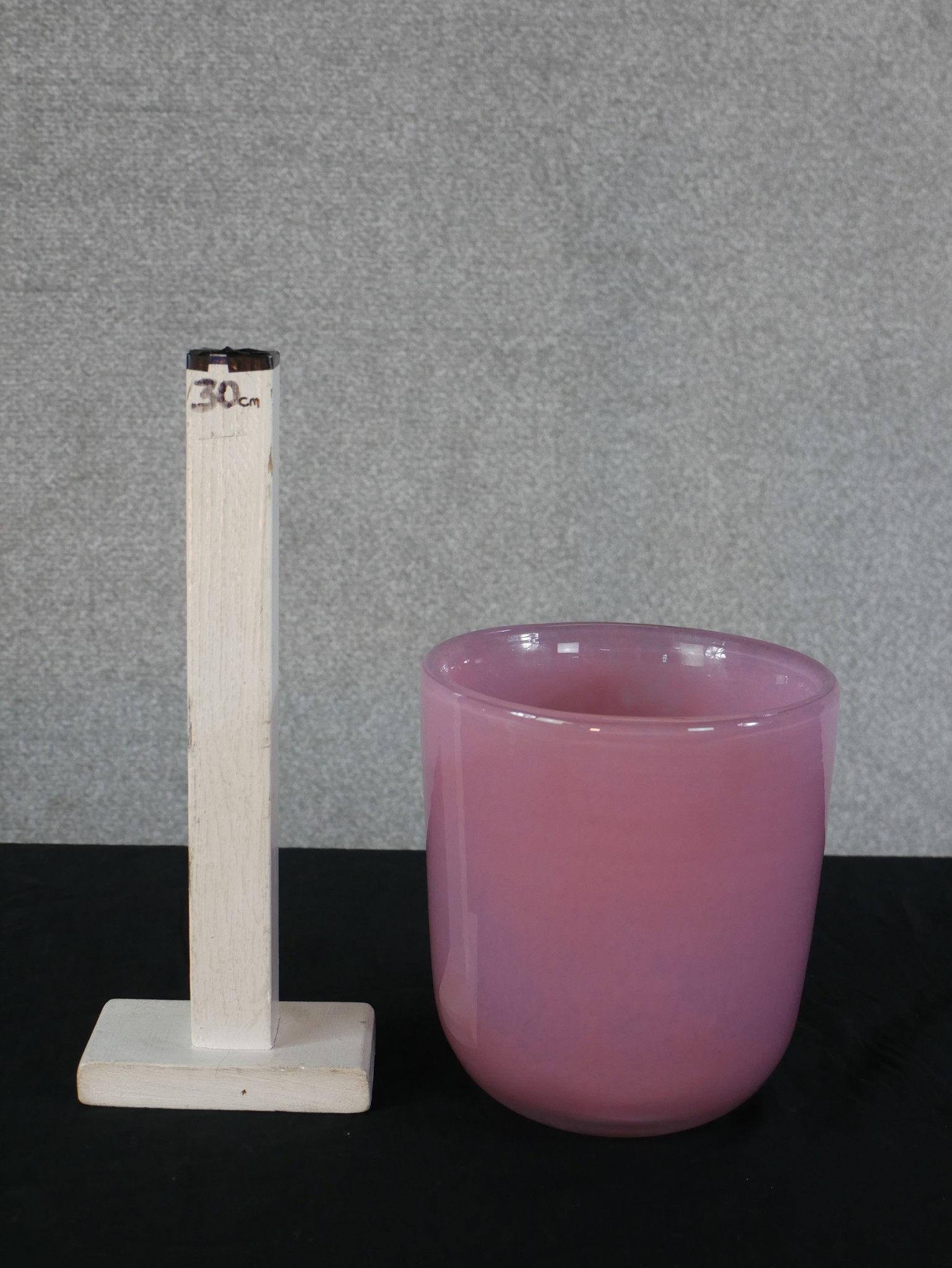 A large studio glass vase by Henry Dean, of cylindrical form in pink, signed to the base. H.19 W. - Image 4 of 4