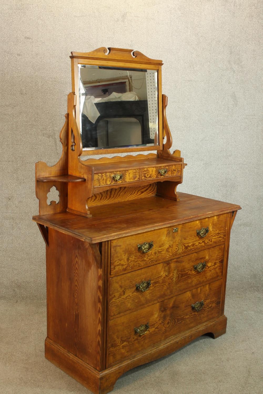 A late 19th/early 20th century pine mirror back dressing chest with three long drawers raised on - Image 3 of 4