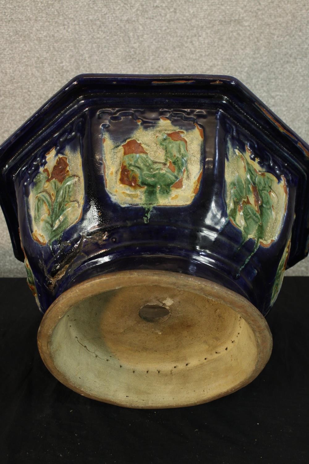 A 20th century Chinese pottery octagonal shaped garden planter decorated with panels of flowers - Image 3 of 3