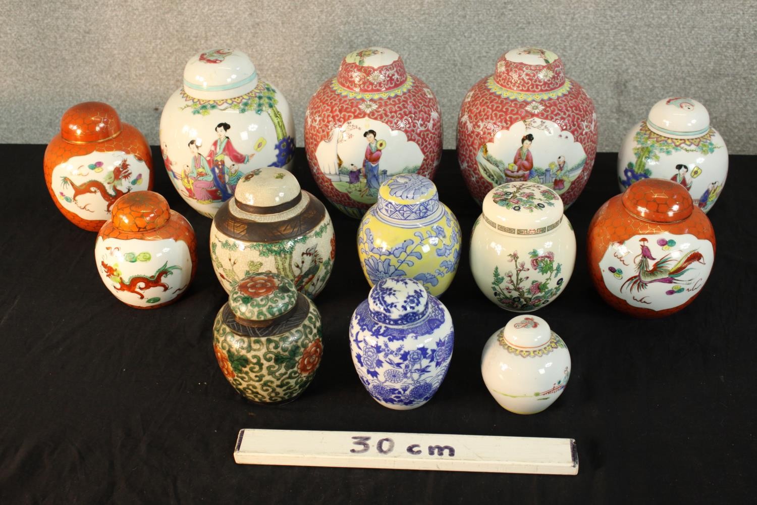 A pair of 20th century Chinese porcelain ginger jars and covers, decorated with characters in a - Image 2 of 3