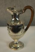 An Edwardian hallmarked silver coffee pot, hallmarked for Gold & Silversmiths Company, London