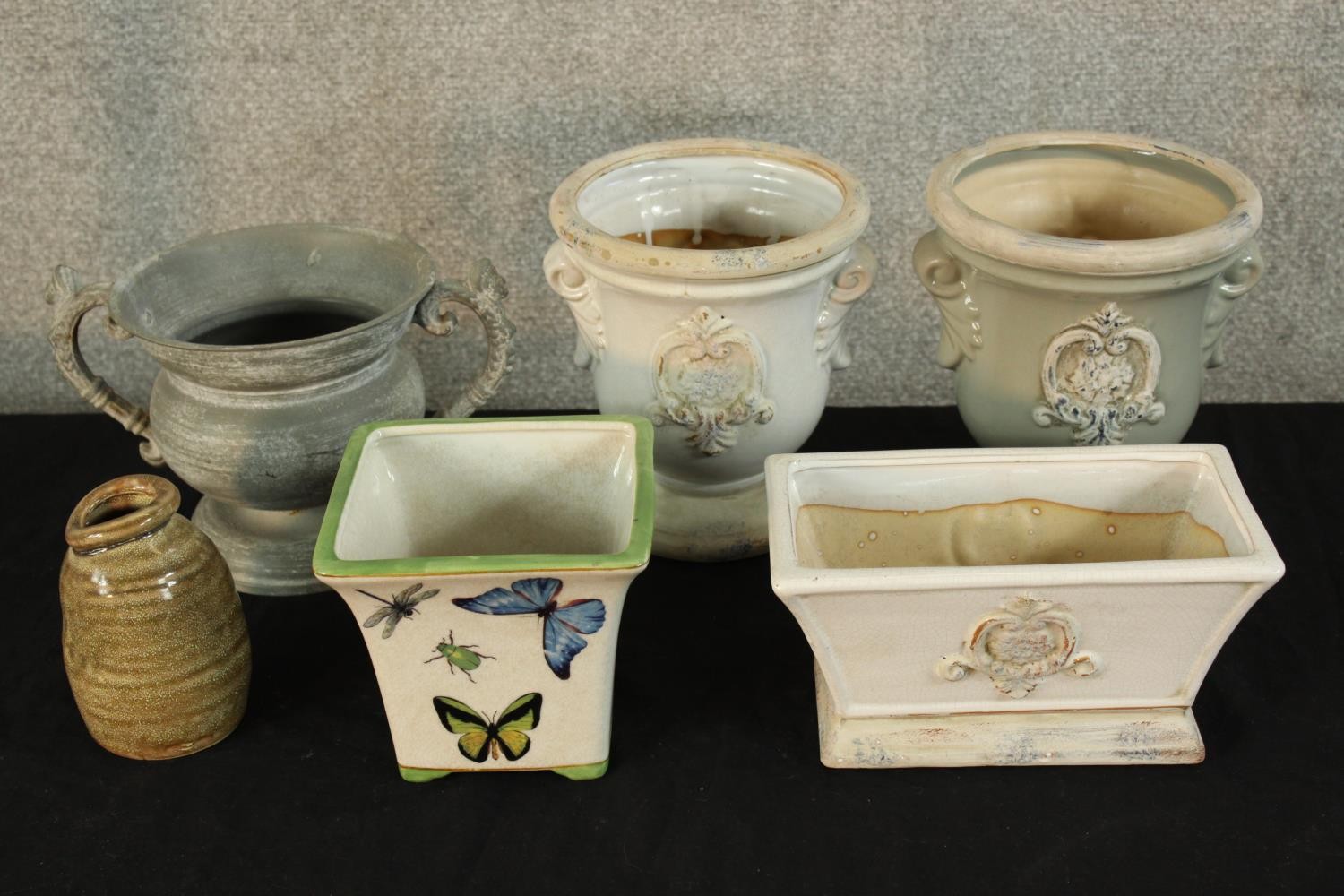 A pair of 20th century painted pottery urn planters together with four other various planters. H.