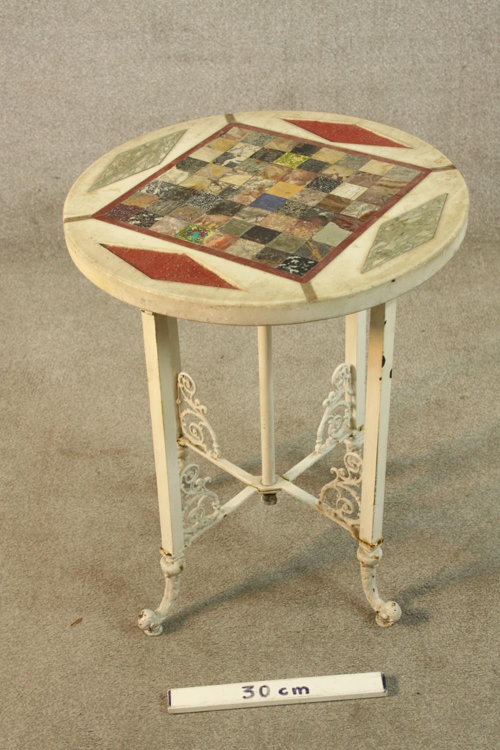 A 19th century specimen marble and hardstone set circular table raised on four painted cast iron - Image 2 of 3