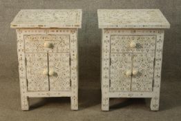 A pair of Moorish style painted single drawer above twin door bedside cabinets with turned handles