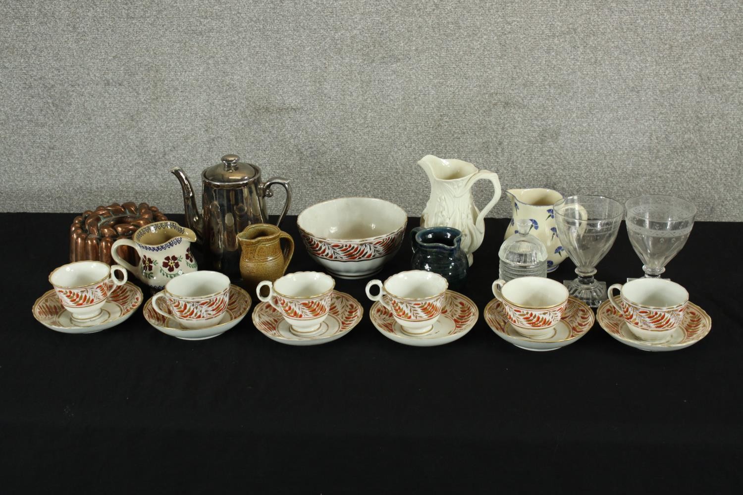 A 19th century English porcelain, possibly Worcester part teaset decorated with abstract pattern,