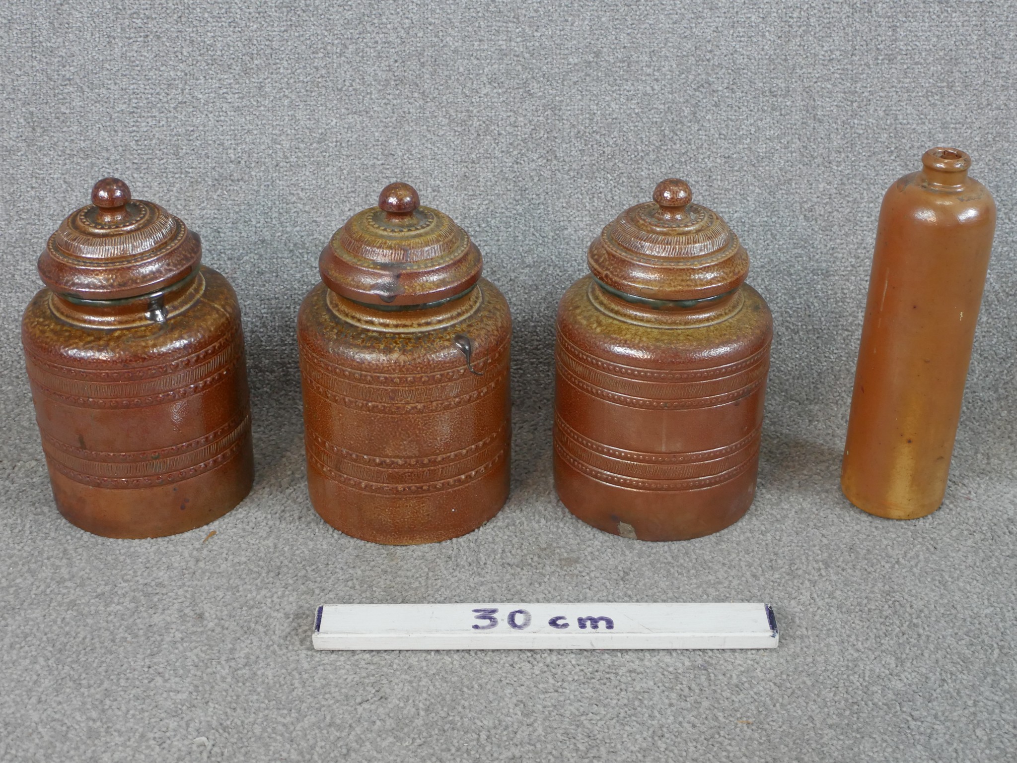 Three 19th century salt glaze Campos Filhos Aveiro pottery lidded storage jars and a similar bottle. - Image 7 of 7