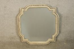 A contemporary Italian style composite wall mirror. H.80 W.79cm.